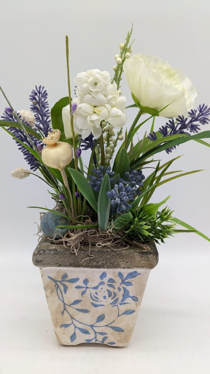 Tischgesteck Sommergesteck Schnecke Lavendel Mohnkapsel Mohnblüte Gräser blau weiß