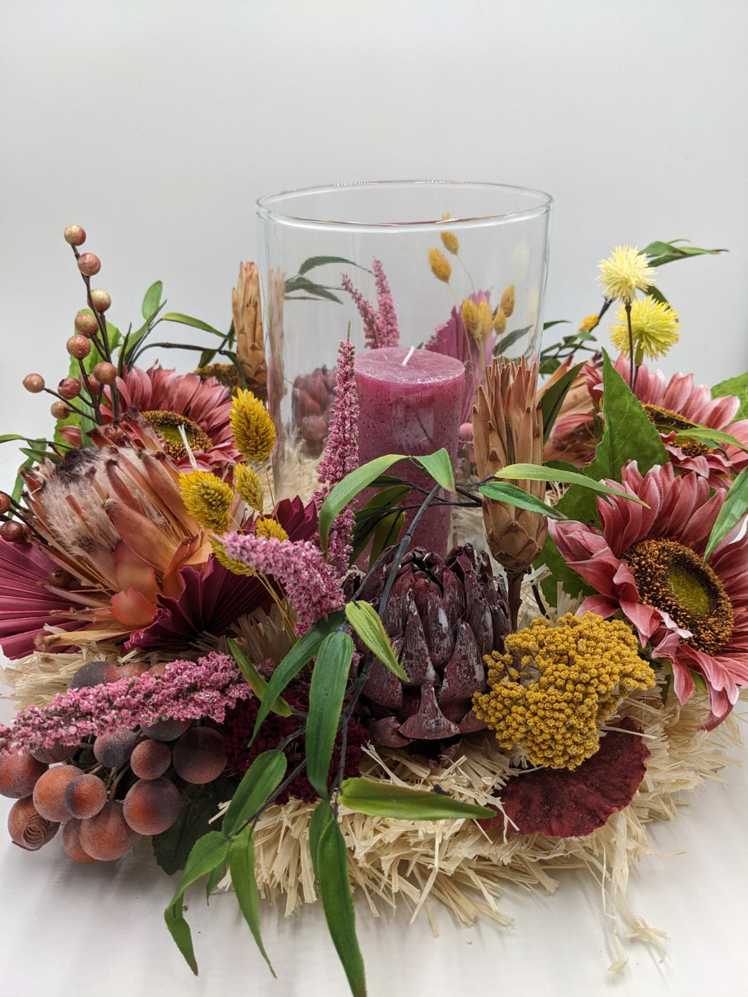 Tischgesteck Sommergesteck Windlicht Kerze Sonnenblumen Heide Beeren Gräser rosa gelb