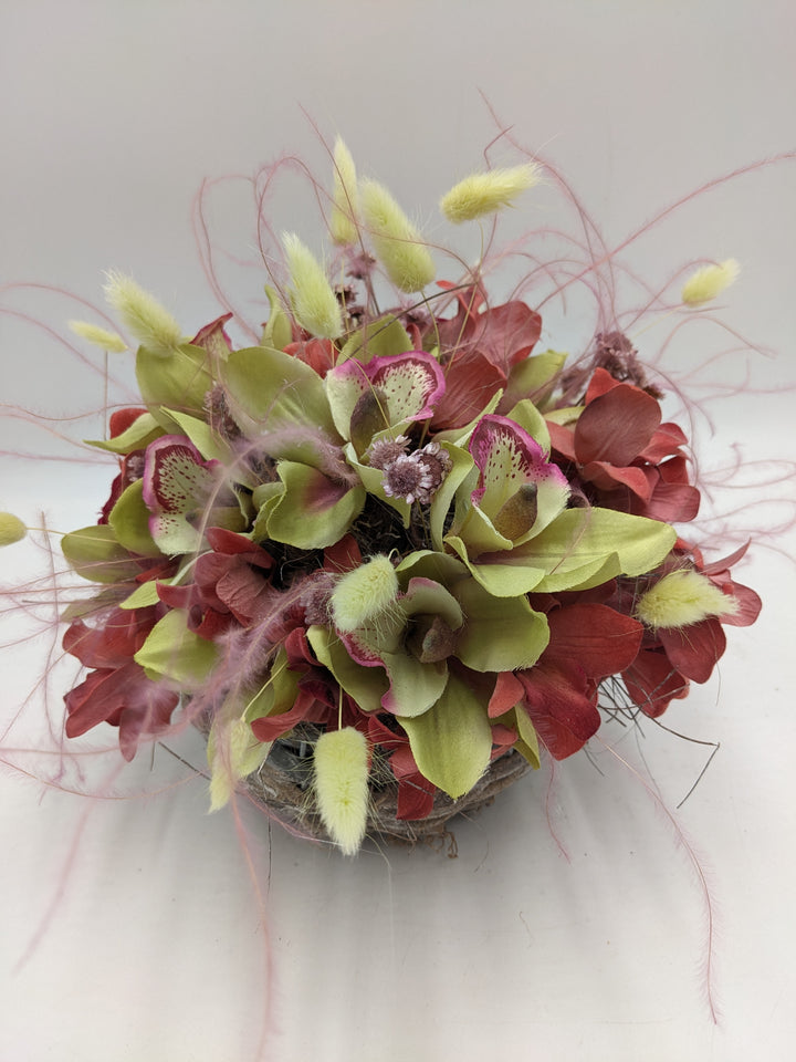 Sommergesteck Feder Orchidee rosa