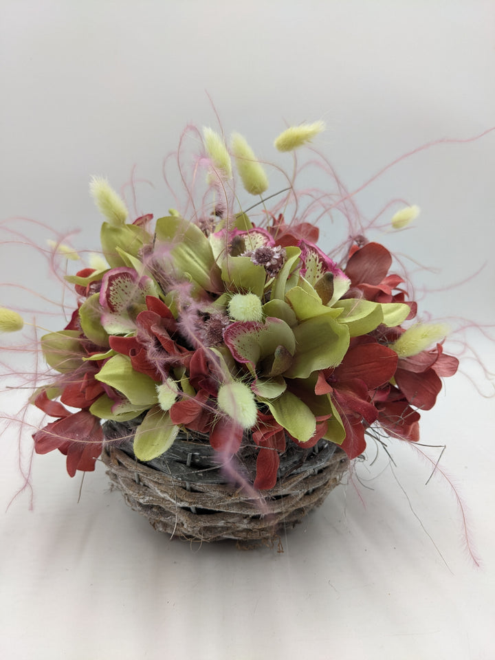 Sommergesteck Feder Orchidee rosa
