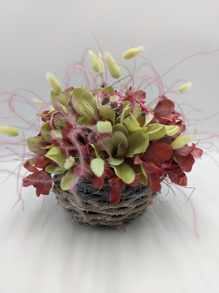 Sommergesteck Feder Orchidee rosa