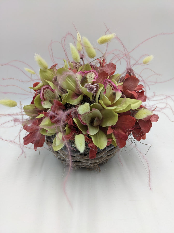 Sommergesteck Feder Orchidee rosa