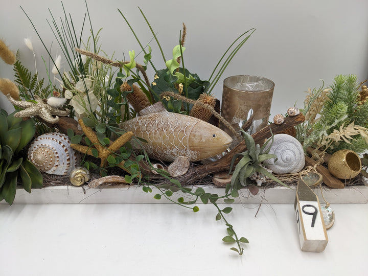 Sommergesteck maritim Teelicht Schnecke Seestern creme