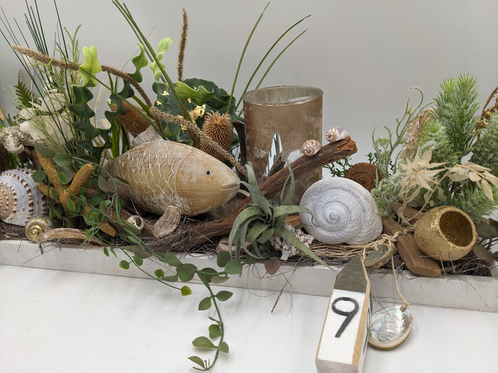 Sommergesteck maritim Teelicht Schnecke Seestern creme
