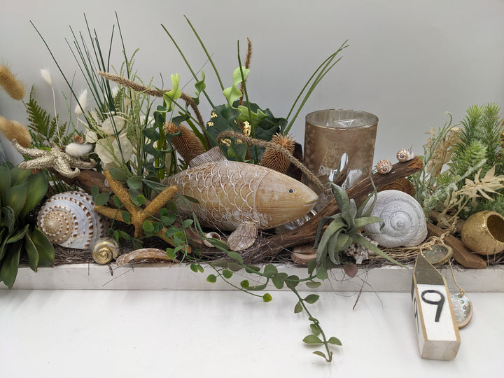 Sommergesteck maritim Teelicht Schnecke Seestern creme