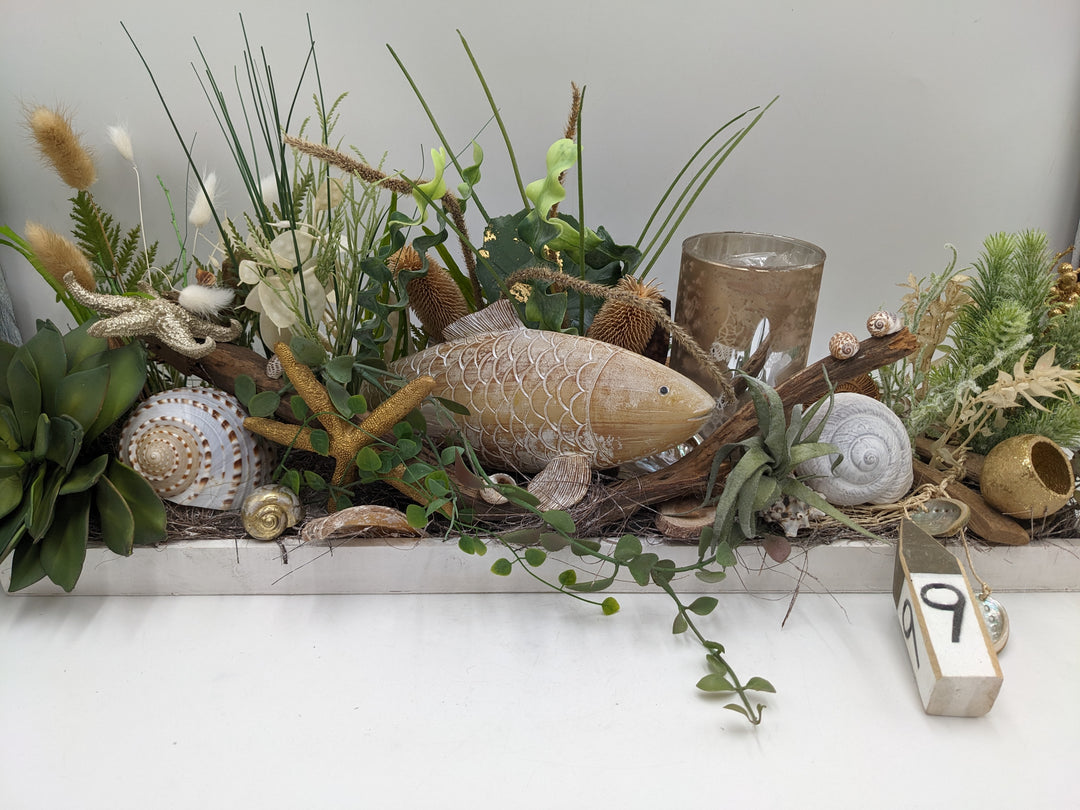 Sommergesteck maritim Teelicht Schnecke Seestern creme