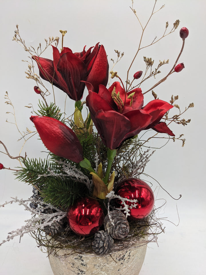 Weihnachtsgesteck Kugel Zapfen Amaryllis rot