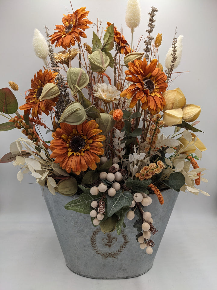 Sommergesteck Gerbera Physalis Beeren orange