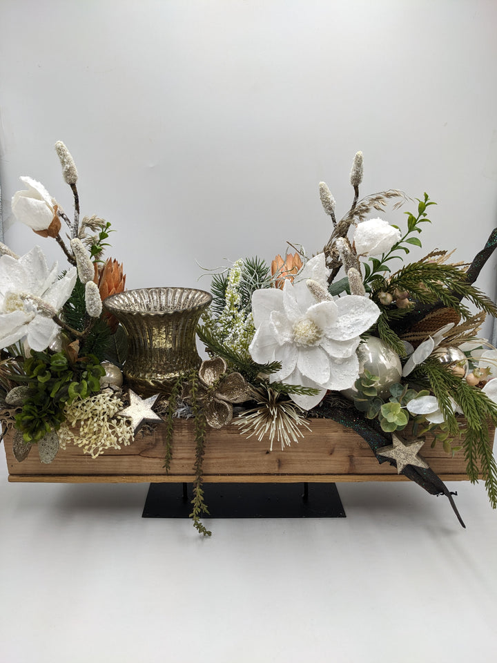 Weihnachtsgesteck Teelicht Kugel Stern Magnolie weiß