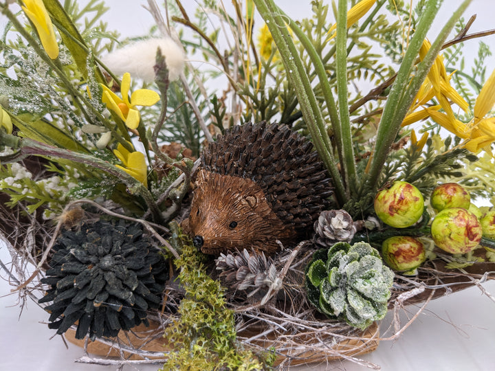 Herbstgesteck Zapfen Igel Beeren gelb