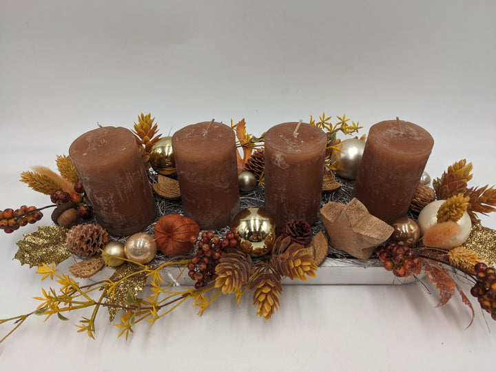 Adventsgesteck Kugel Stern Zapfen orange
