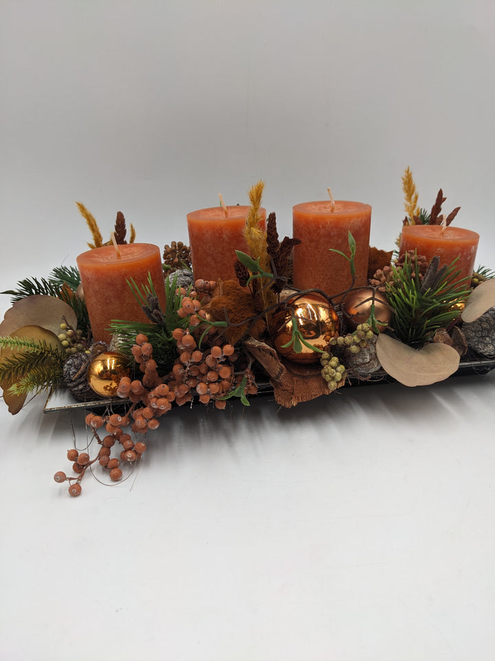 Adventsgesteck Kugel Stern Beeren orange