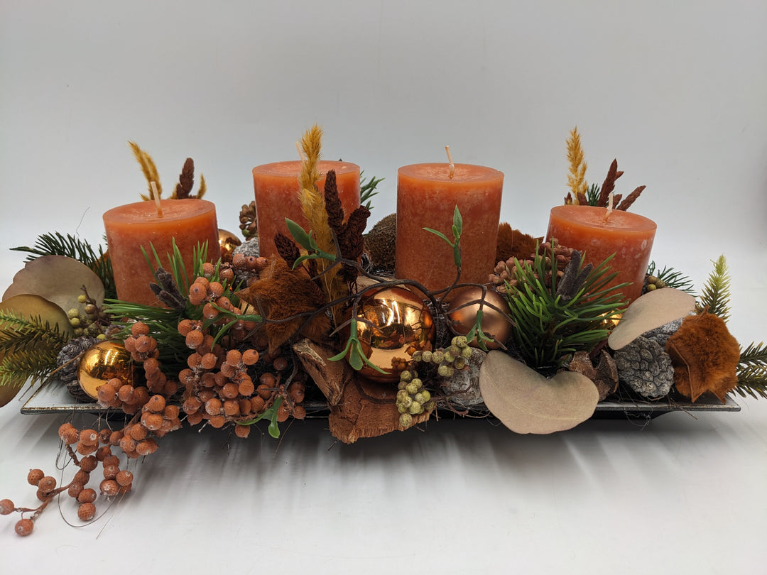 Adventsgesteck Kugel Stern Beeren orange
