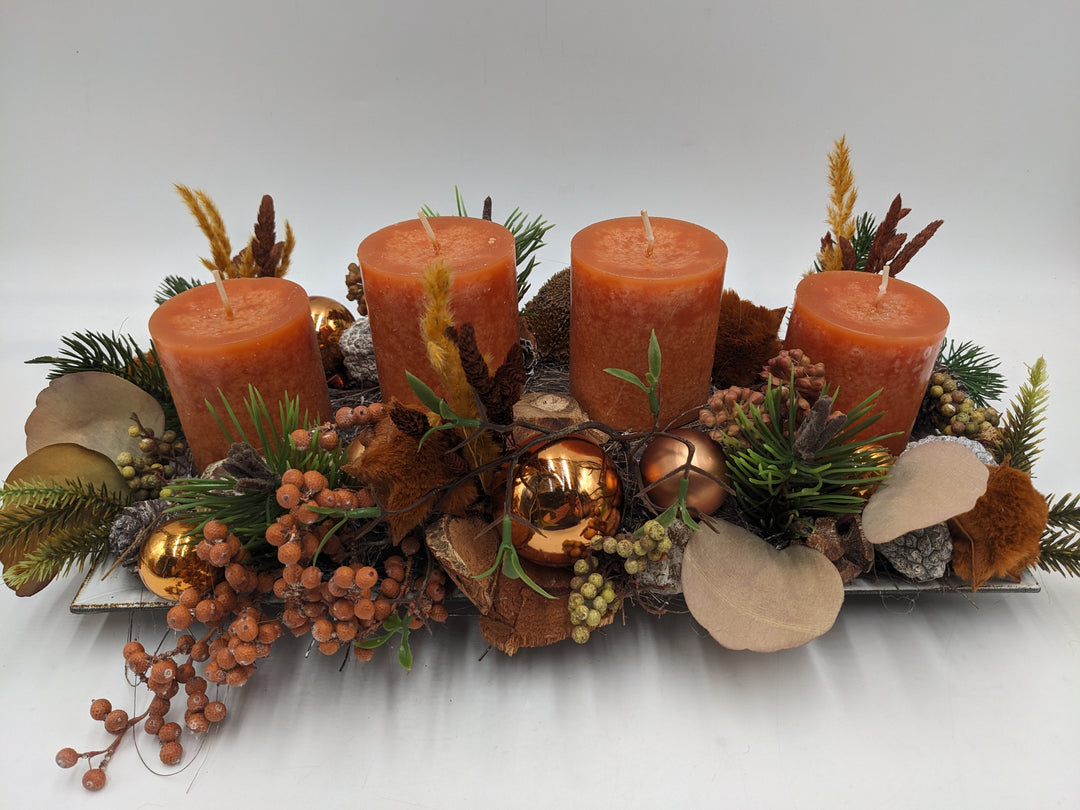 Adventsgesteck Kugel Stern Beeren orange