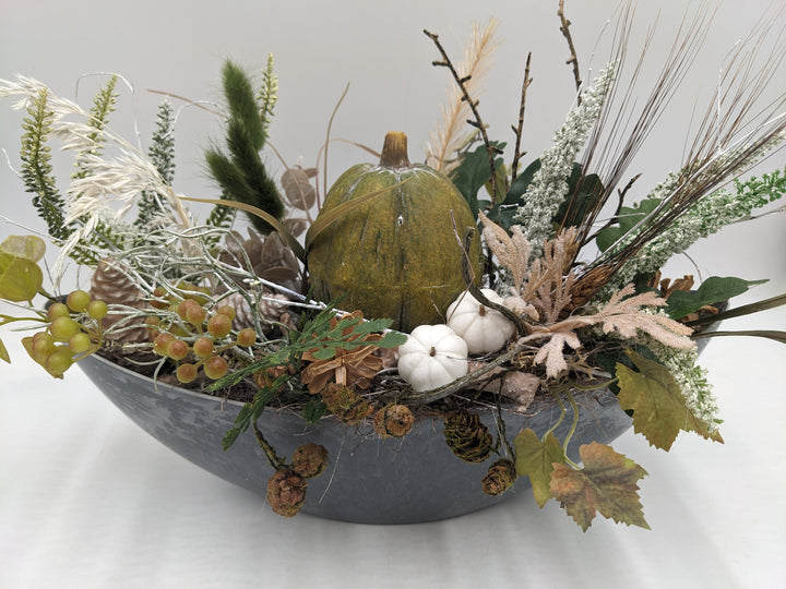 Herbstgesteck Kürbis Feder Heide grün