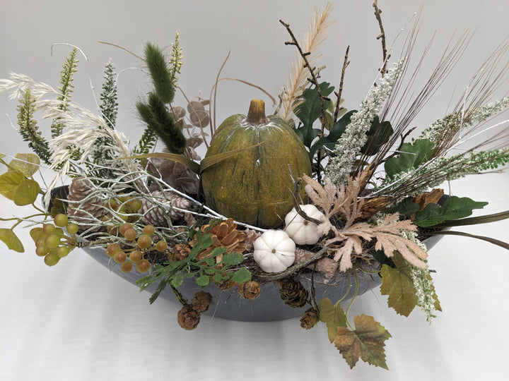 Herbstgesteck Kürbis Feder Heide grün