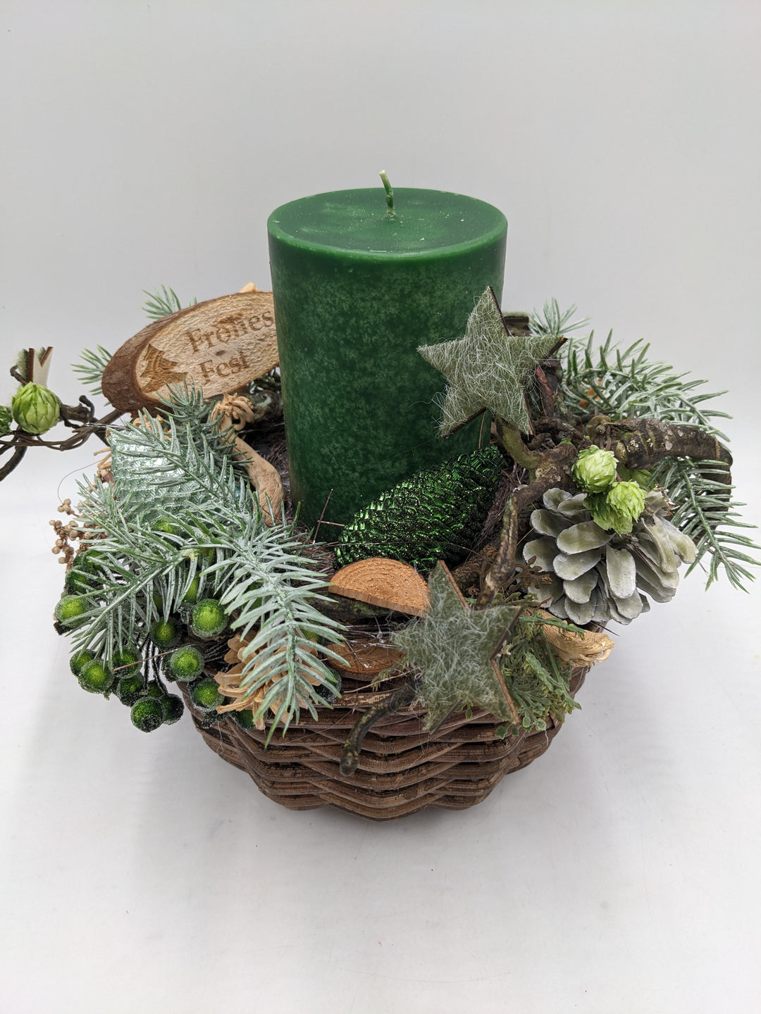 Weihnachtsgesteck Frohes Fest Zapfen Stern grün