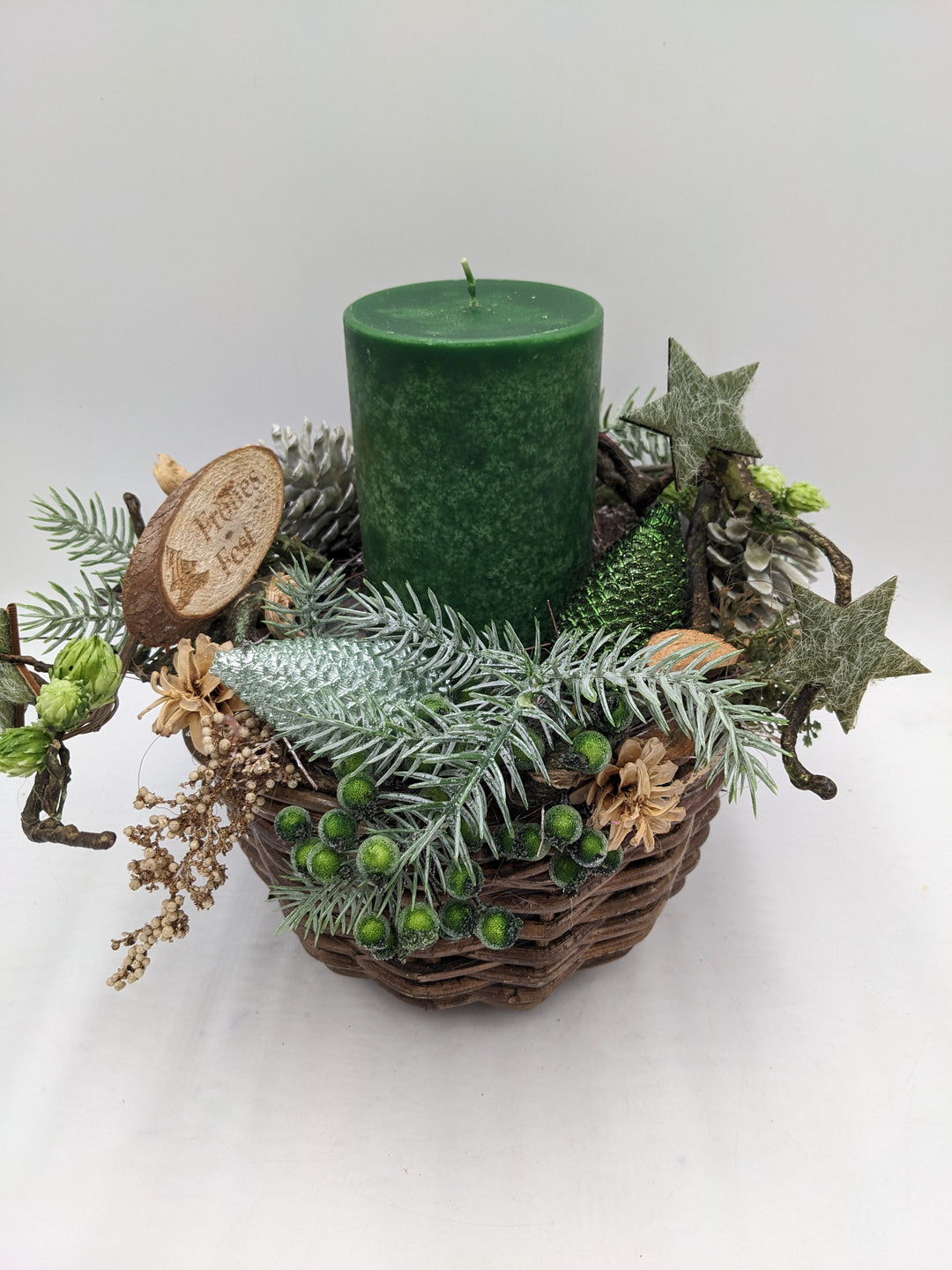 Weihnachtsgesteck Frohes Fest Zapfen Stern grün