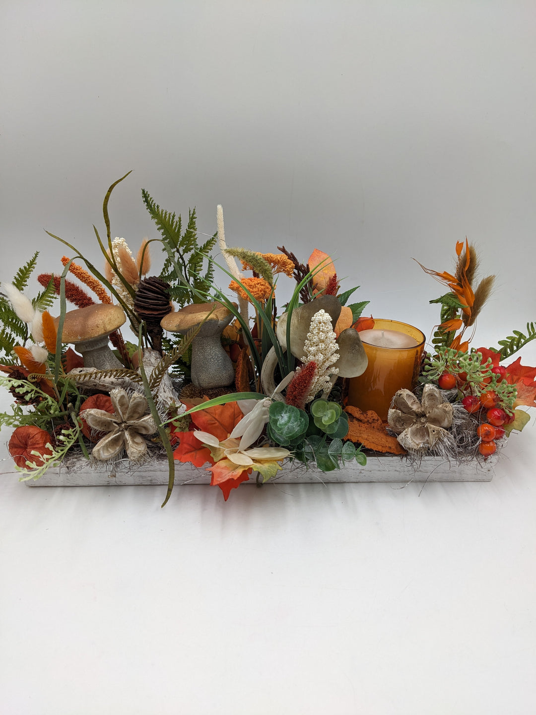 Herbstgesteck Teelicht Pilz Physalis orange