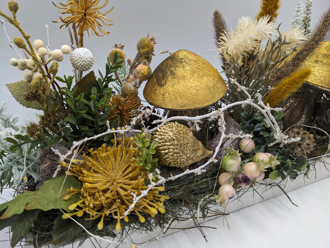 Herbstgesteck Lichterkette Pilz Igel gold