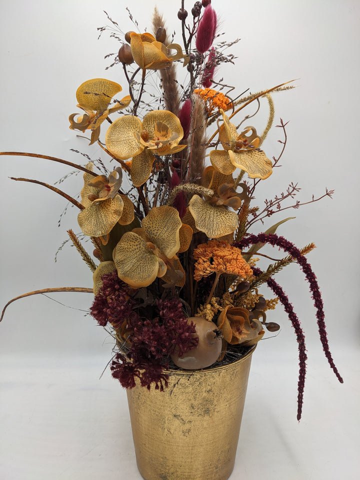 Herbstgesteck Orchidee Blüten orange