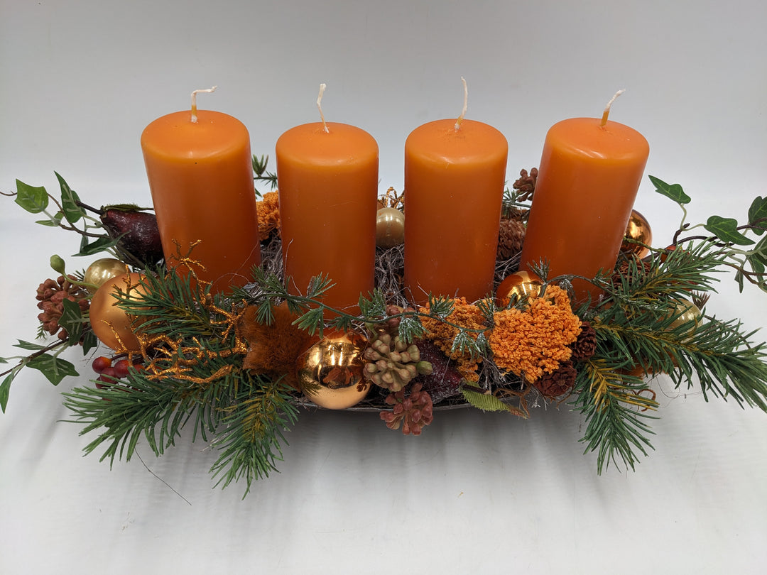 Adventsgesteck Kugel Zapfen Stern orange