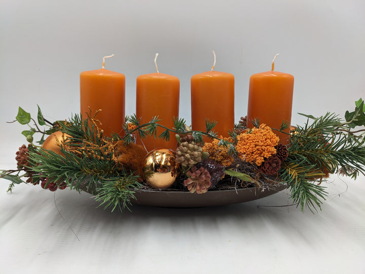 Adventsgesteck Kugel Zapfen Stern orange