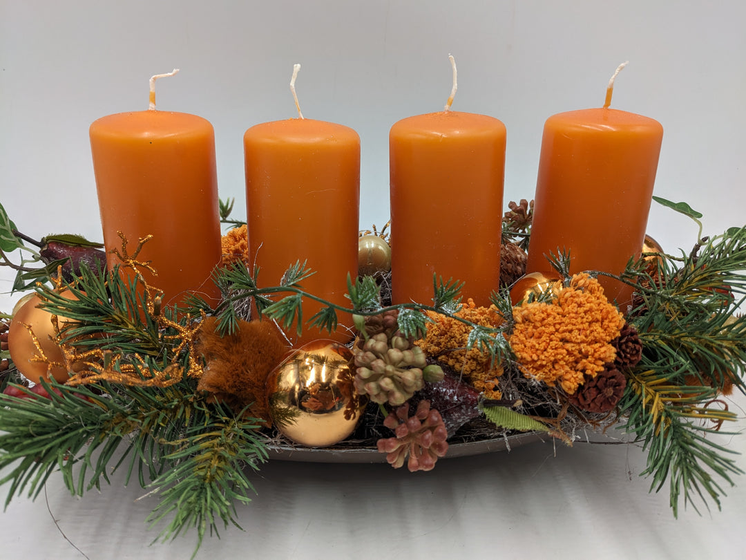 Adventsgesteck Kugel Zapfen Stern orange