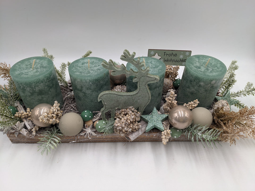 Adventsgesteck Frohe Weihnachten Kugel Hirsch mint