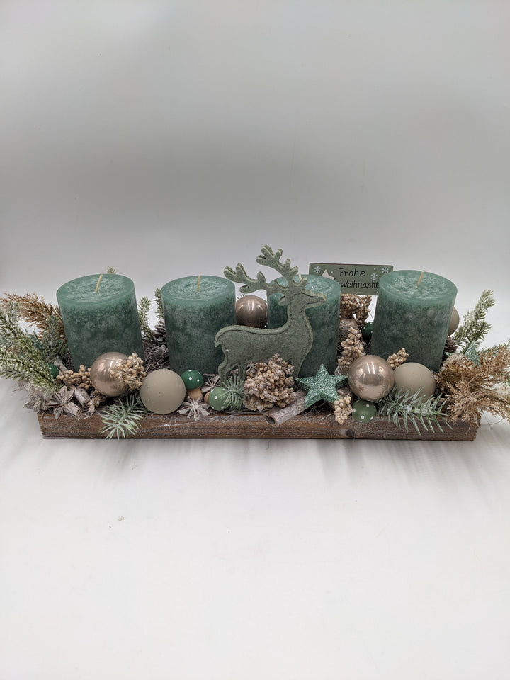 Adventsgesteck Frohe Weihnachten Kugel Hirsch mint