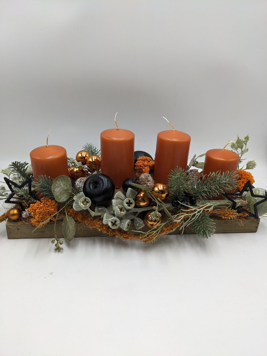 Adventsgesteck Kugel Stern orange