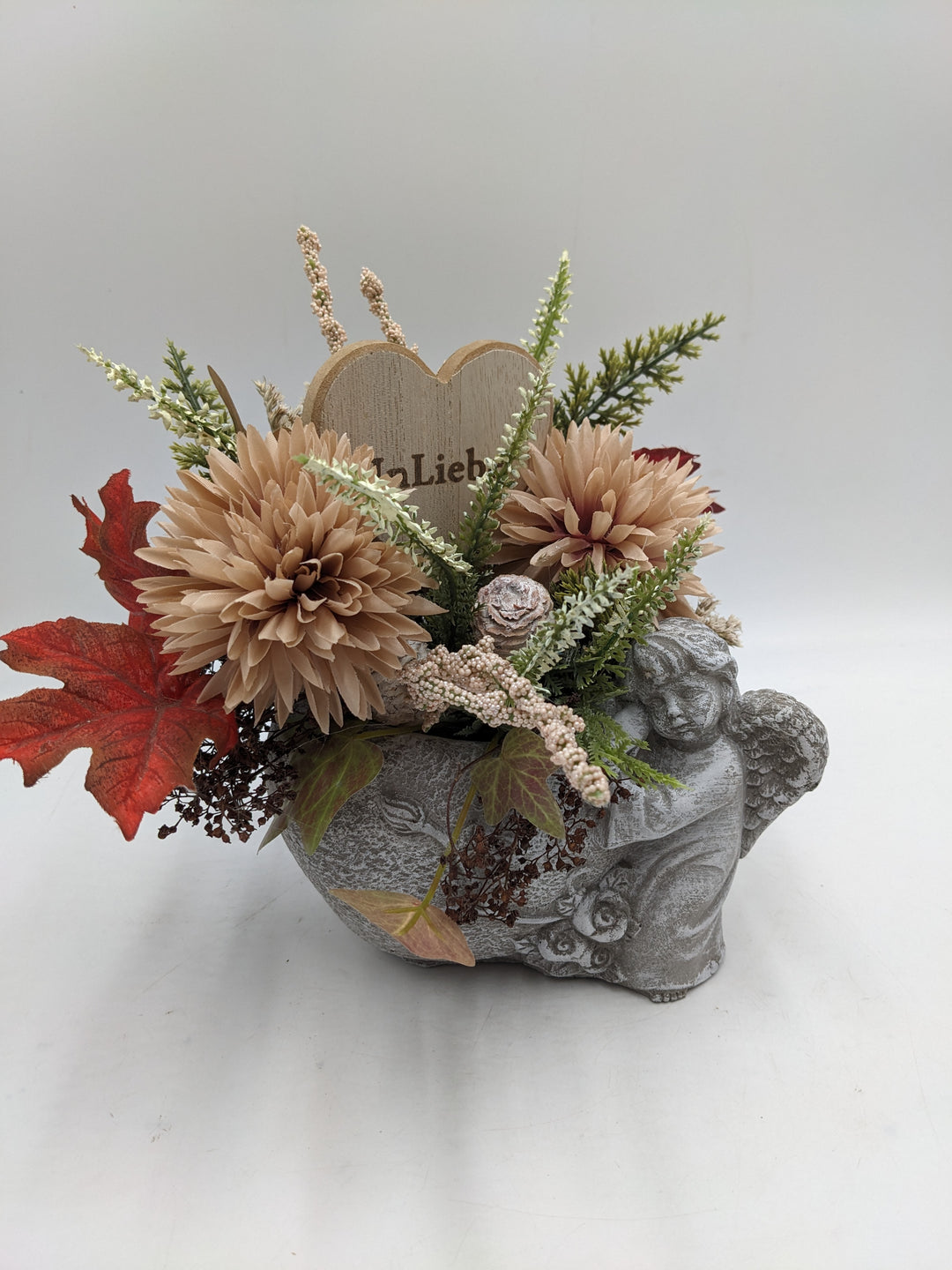 Trauergesteck in Liebe Engel Heide apricote