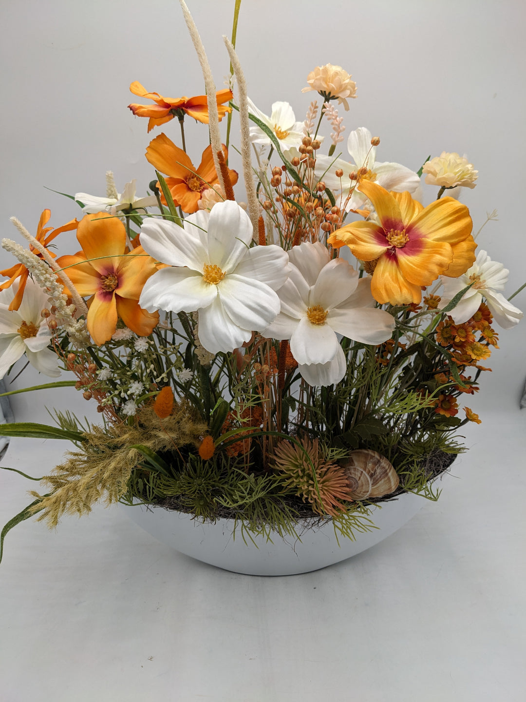 Sommergesteck Schnecke Blüte orange