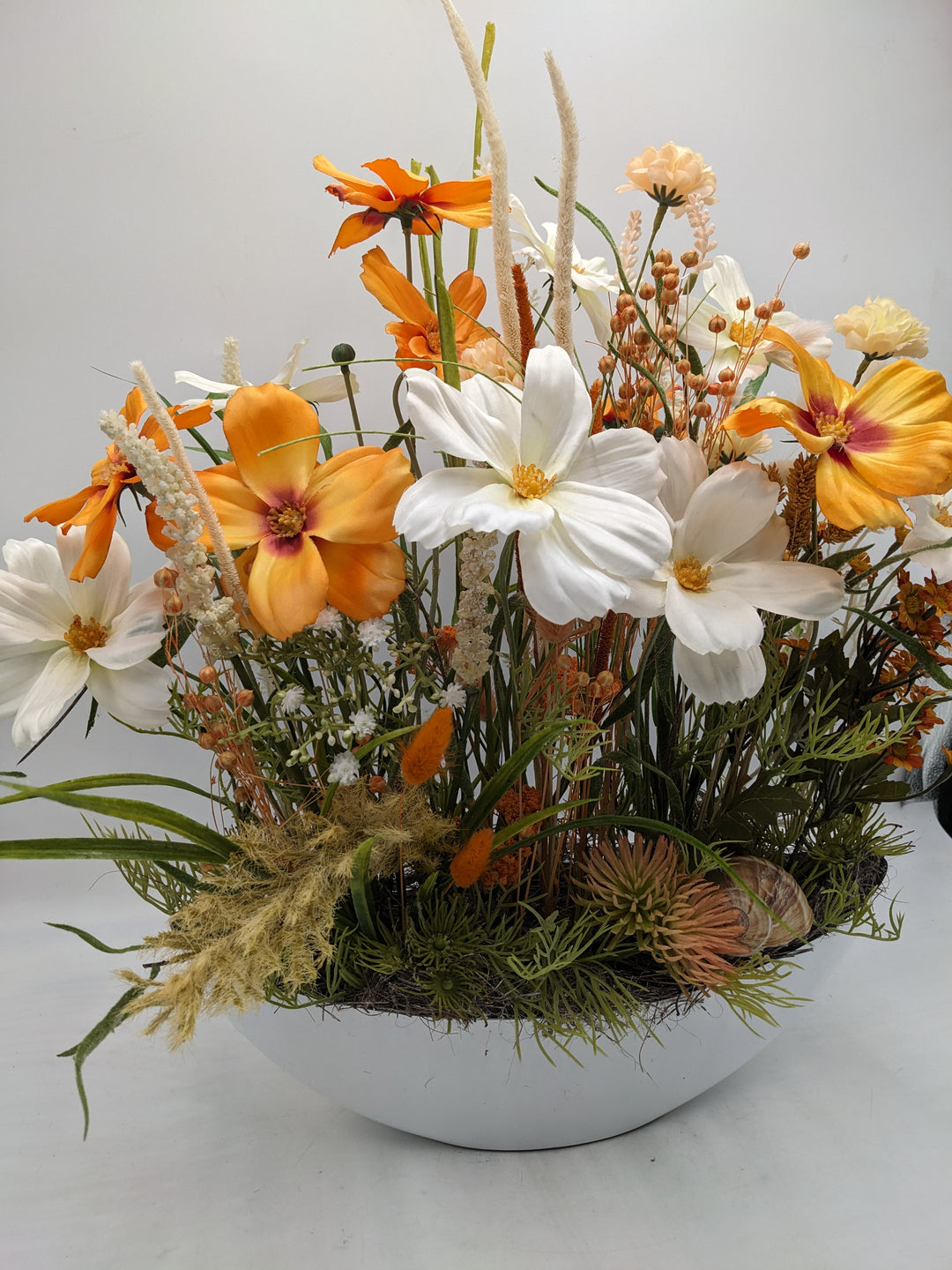 Sommergesteck Schnecke Blüte orange