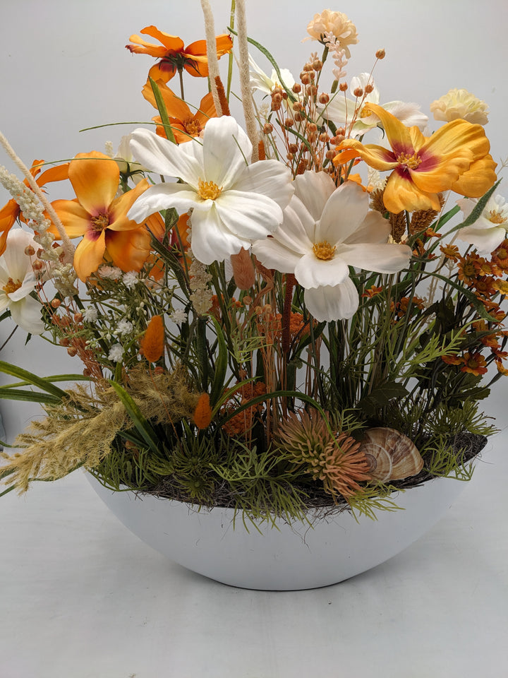 Sommergesteck Schnecke Blüte orange