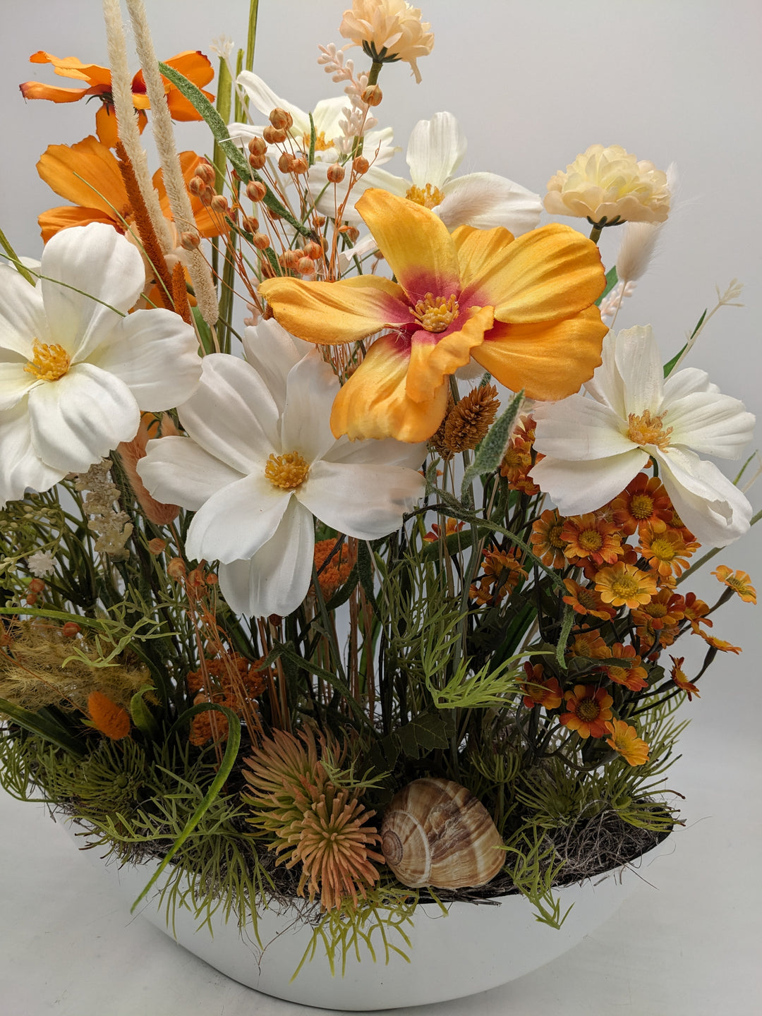 Sommergesteck Schnecke Blüte orange