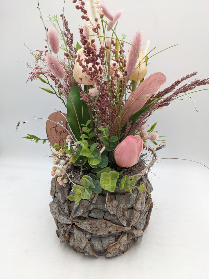 Ostergesteck Frühlingsgesteck Tulpen Gräser Feder rosa