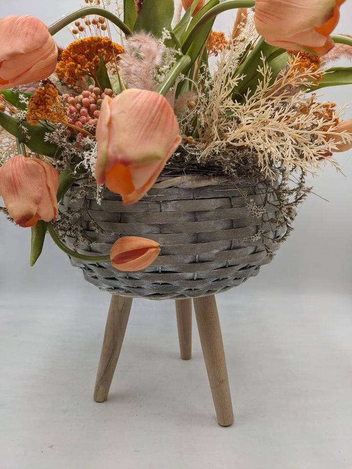 Frühlingsgesteck Tulpen Gräser orange apricote