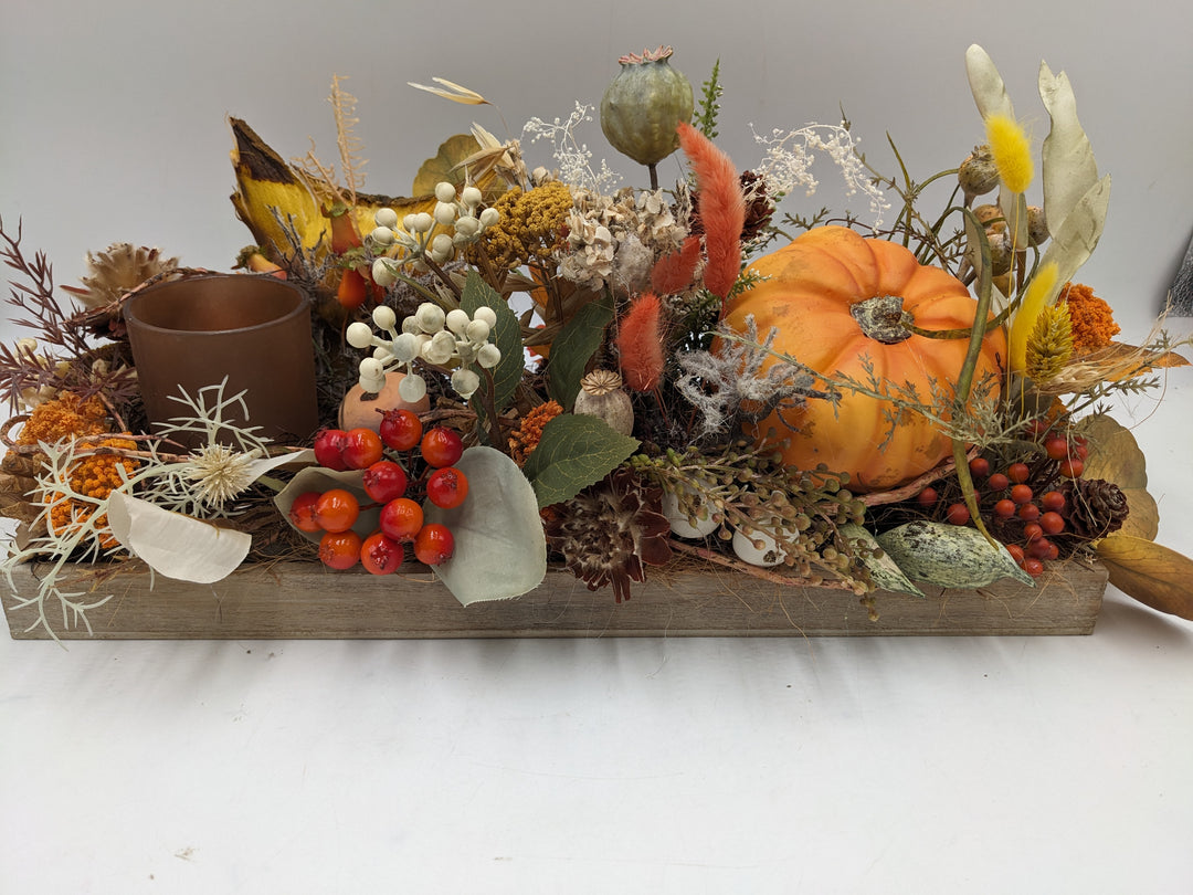 Herbstgesteck Kürbis Teelicht orange