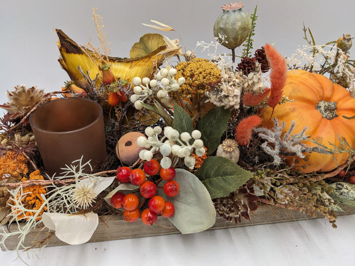 Herbstgesteck Kürbis Teelicht orange