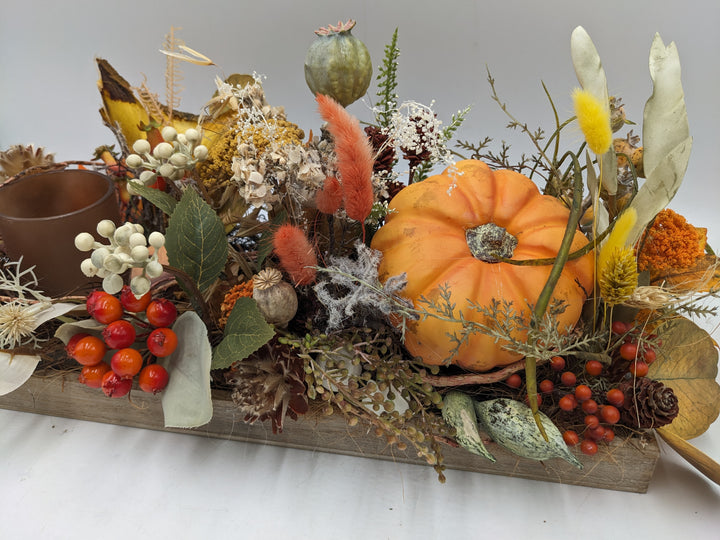 Herbstgesteck Kürbis Teelicht orange