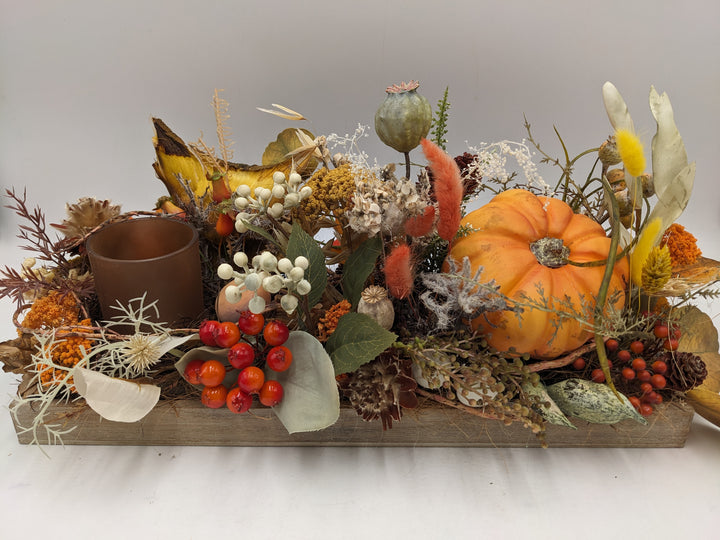 Herbstgesteck Kürbis Teelicht orange