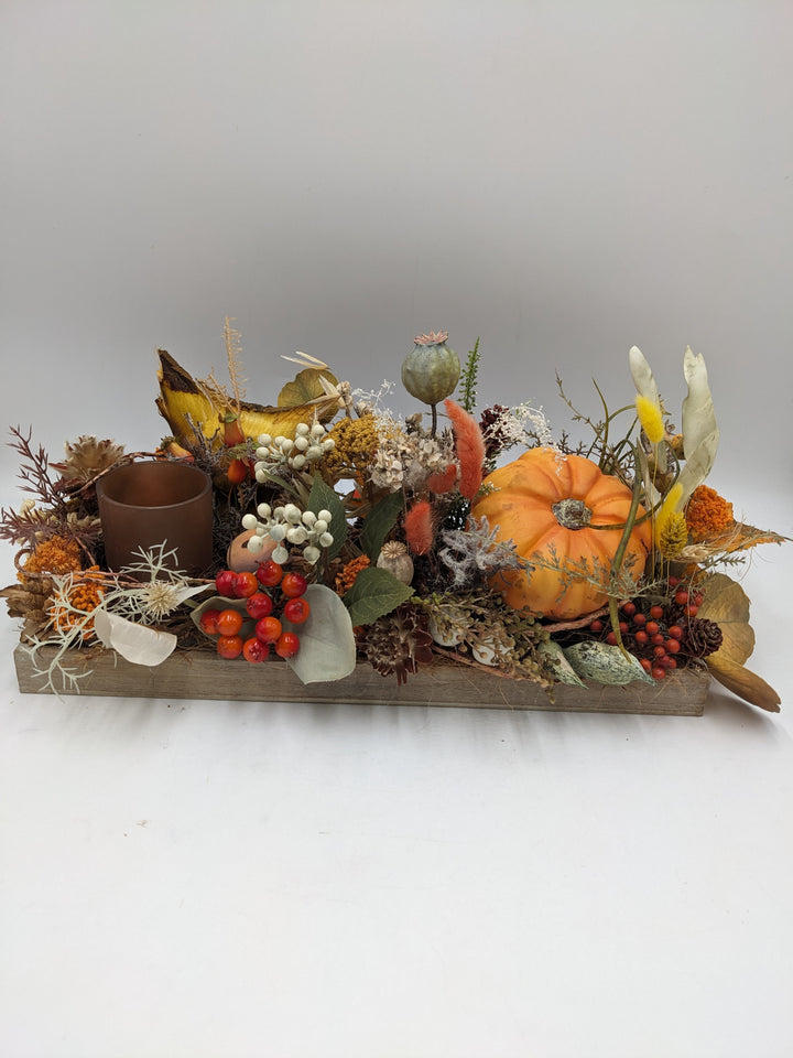 Herbstgesteck Kürbis Teelicht orange