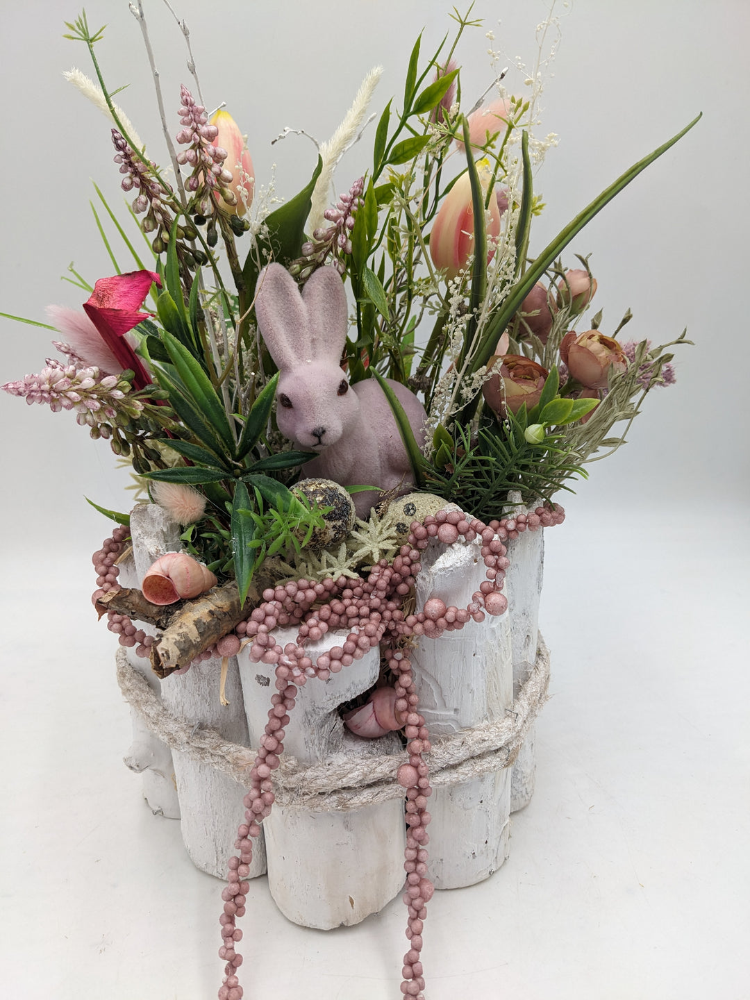 Ostergesteck Frühlingsgesteck Tulpen Hyazinthen Gräser rosa