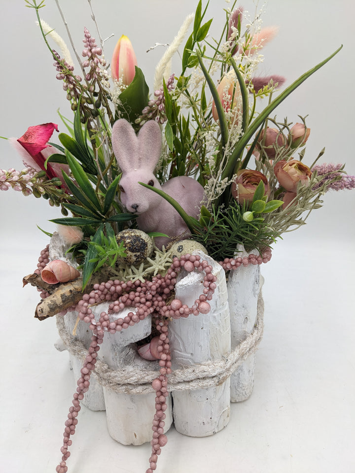 Ostergesteck Frühlingsgesteck Tulpen Hyazinthen Gräser rosa