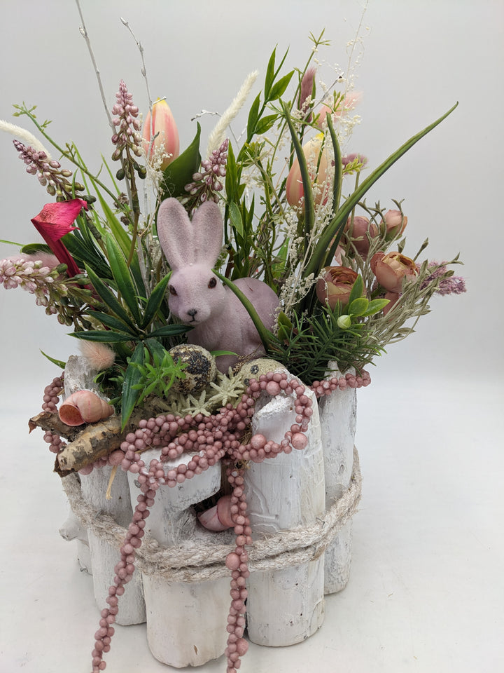 Ostergesteck Frühlingsgesteck Tulpen Hyazinthen Gräser rosa
