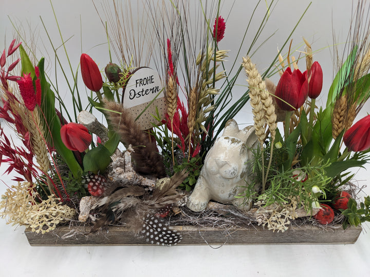 Ostergesteck Frühlingsgesteck Tulpen Gräser Hase rot