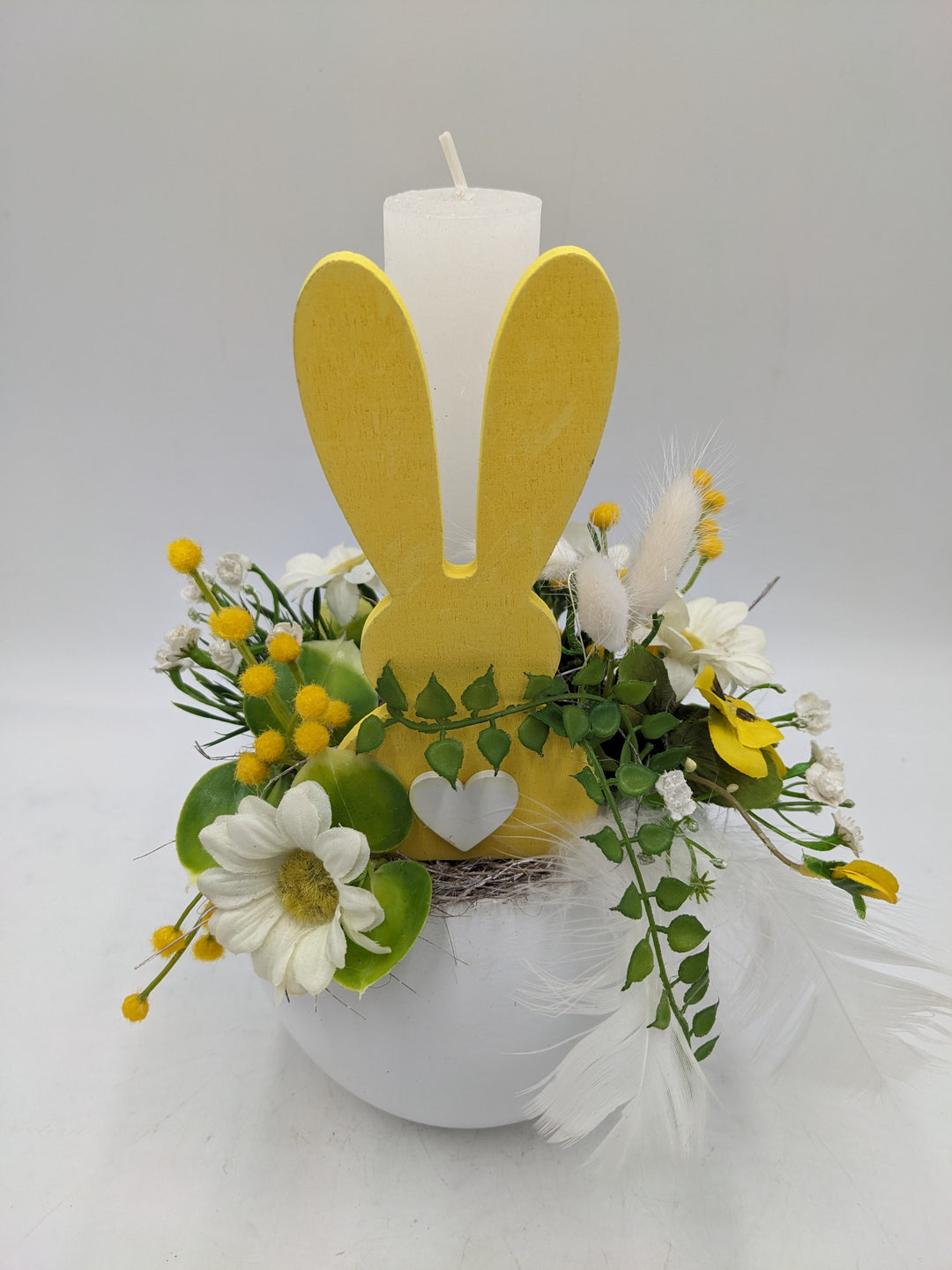 Ostergesteck Frühlingsgesteck Kerze Gräser gelb weiss