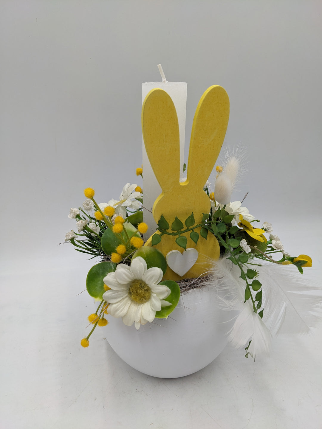 Ostergesteck Frühlingsgesteck Kerze Gräser gelb weiss