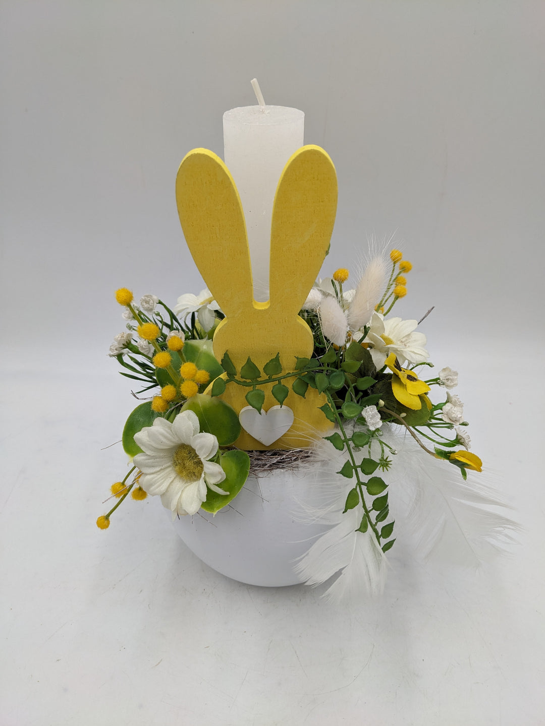 Ostergesteck Frühlingsgesteck Kerze Gräser gelb weiss